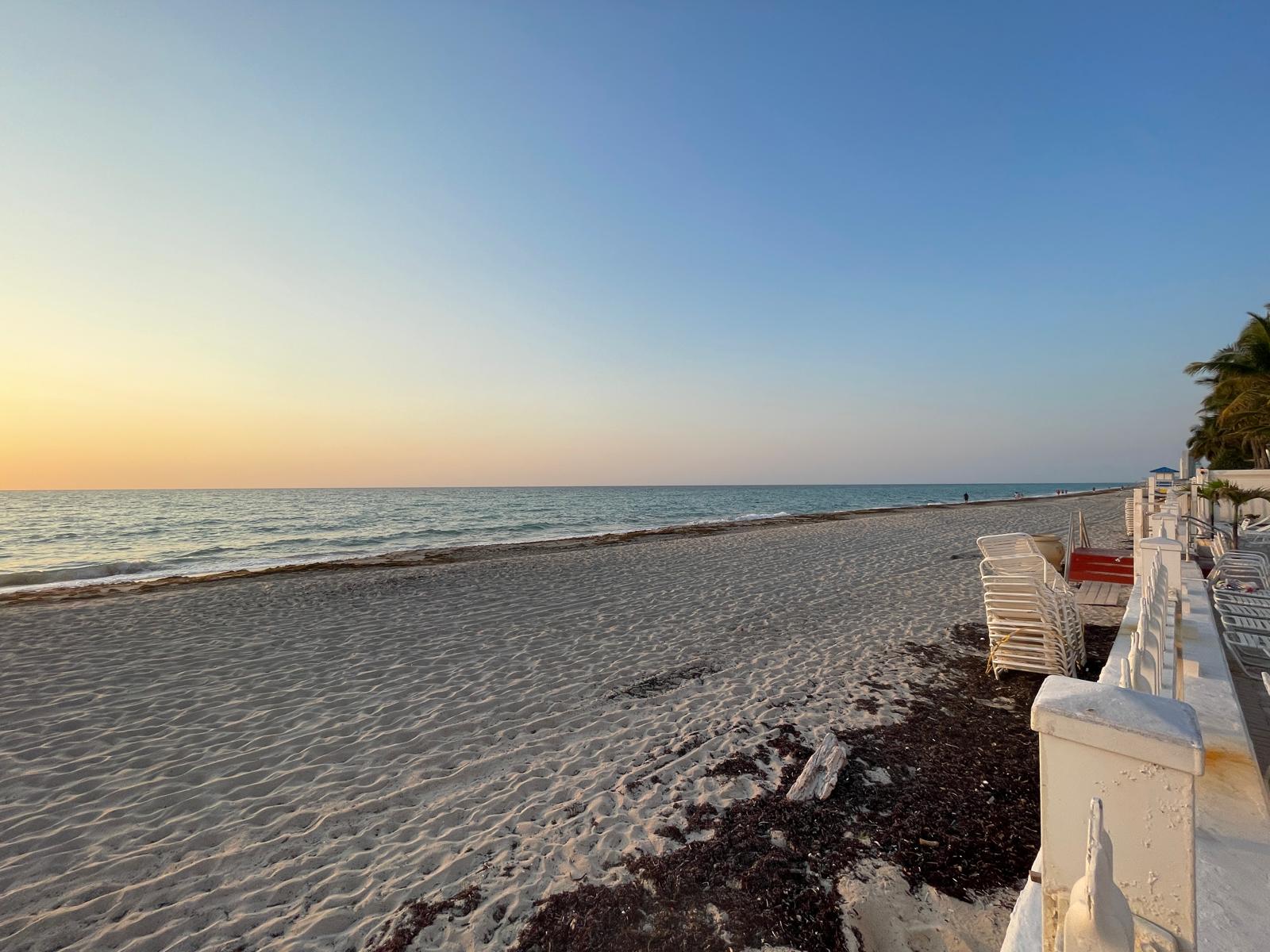 Soft evening light over the sand and Atlantic Ocean directly in front of the residence